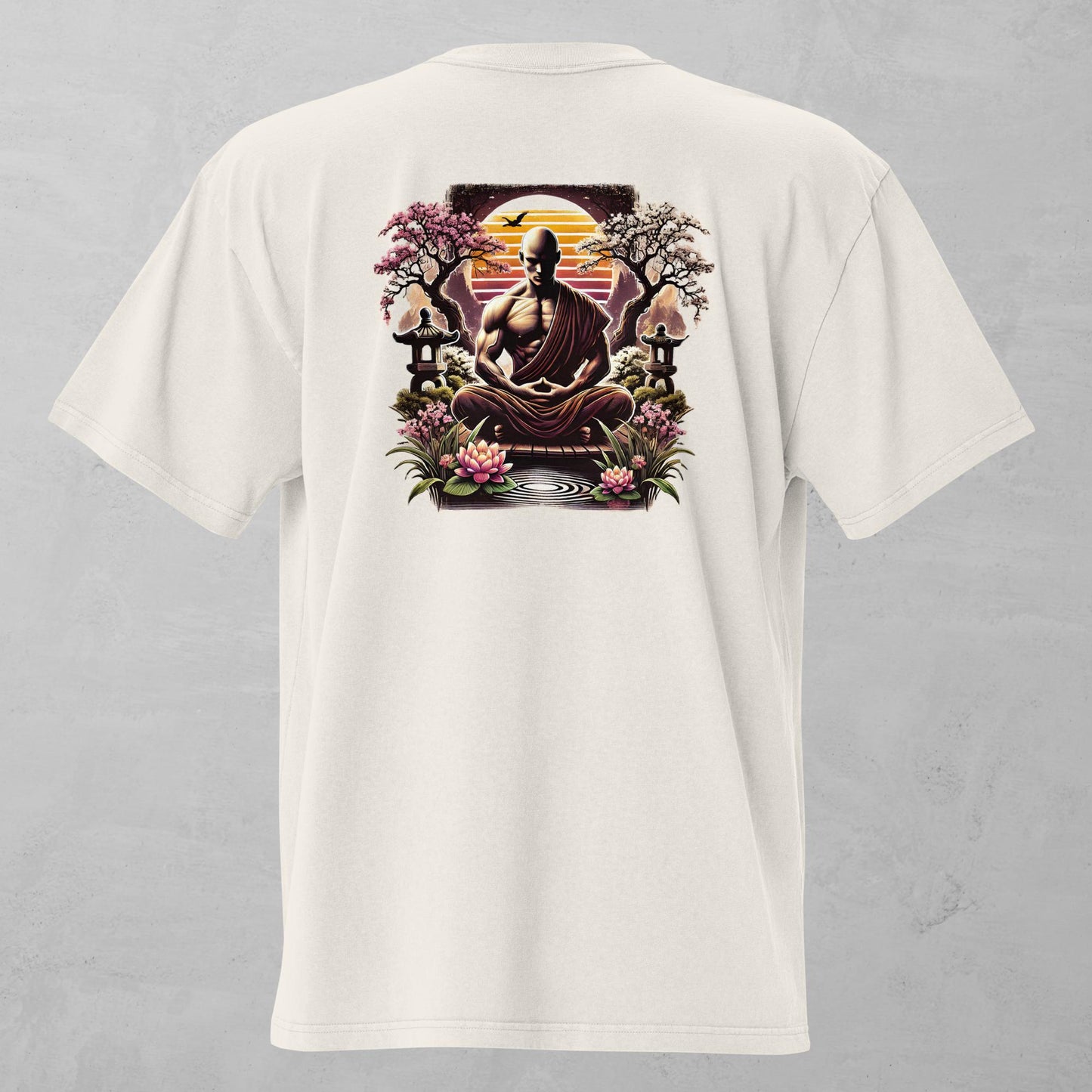 Back view of a faded bone oversized t-shirt featuring a design of a muscular monk meditating in a serene garden with lotus flowers, trees, and lanterns.